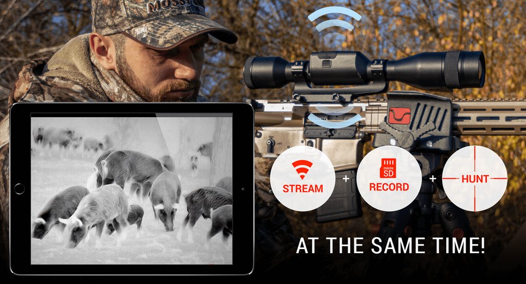 Hunter scanning at night with an ATN thermal optic in the field