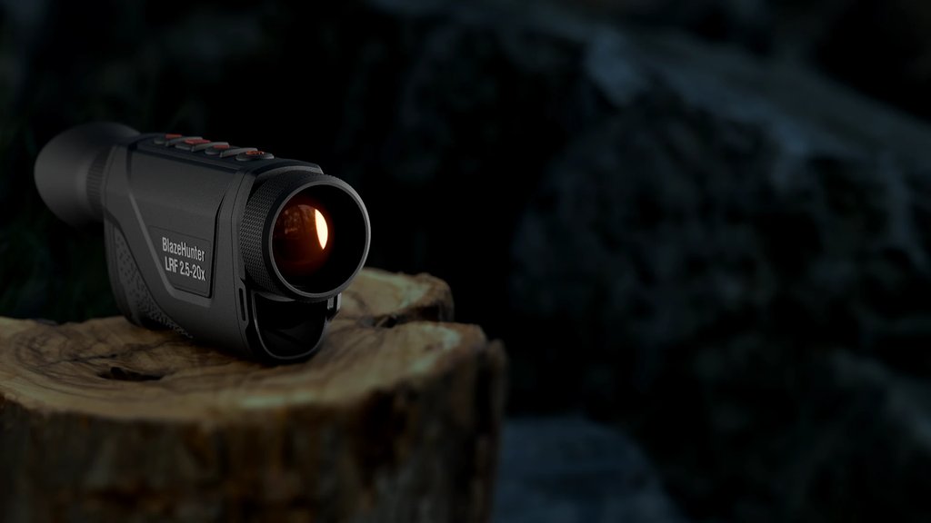 Hunter in the field using an ATN scope at dusk